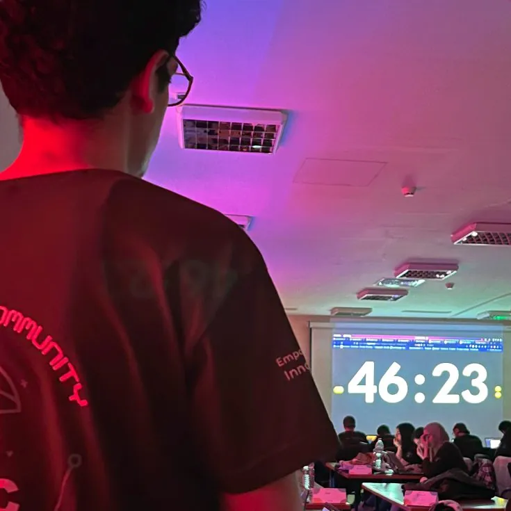 A competitor watches the clock at the first ETCode
